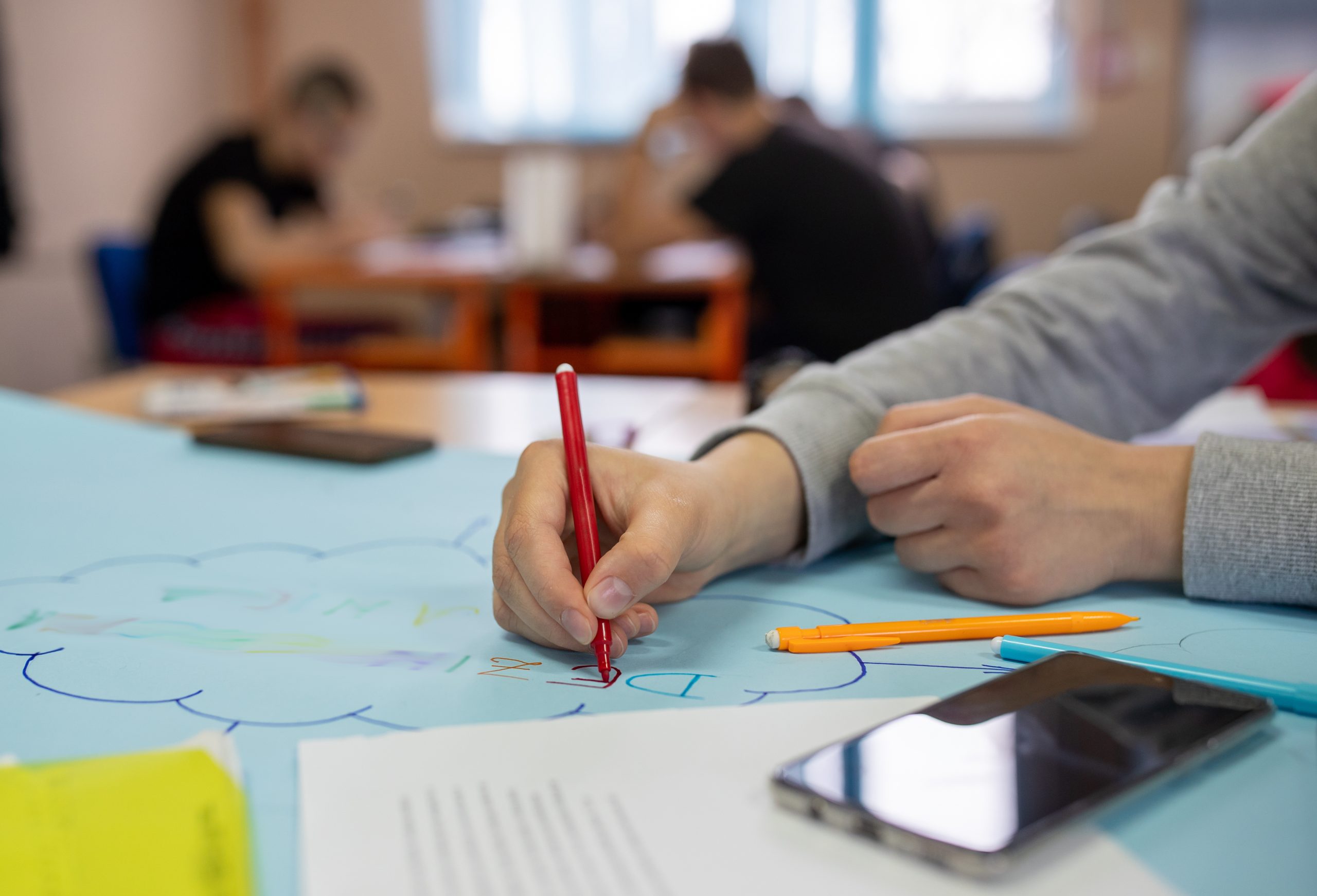 Students working in teams on workshop